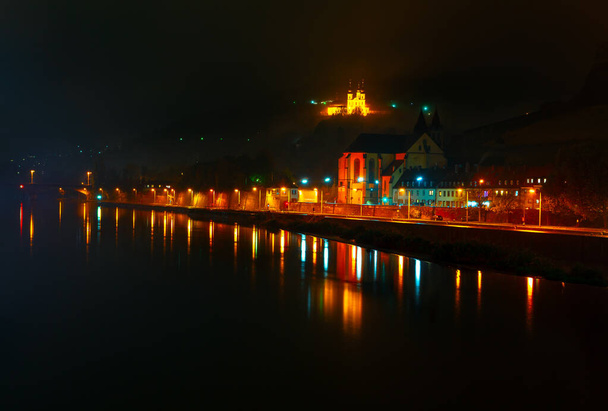 Wurzburg Germany in the night . Main river in the nighttime . Night city reflection in the water  - Foto, Bild