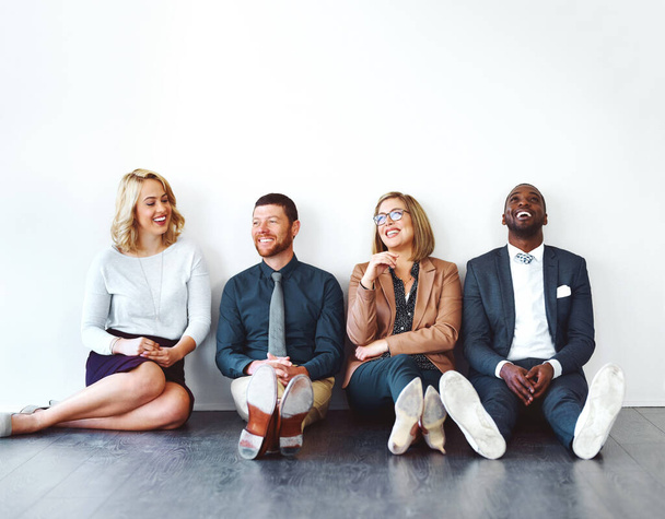 It was all once a dream. a group of entrepreneurs sitting against a white background - Foto, Imagem