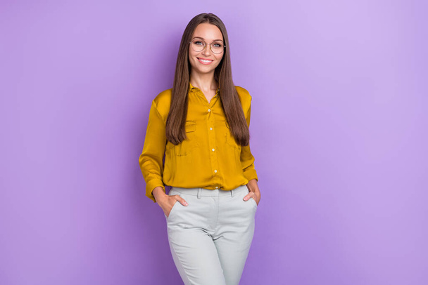 Portrait of gorgeous positive person toothy smile put hands pockets isolated on purple color background. - Foto, Imagem