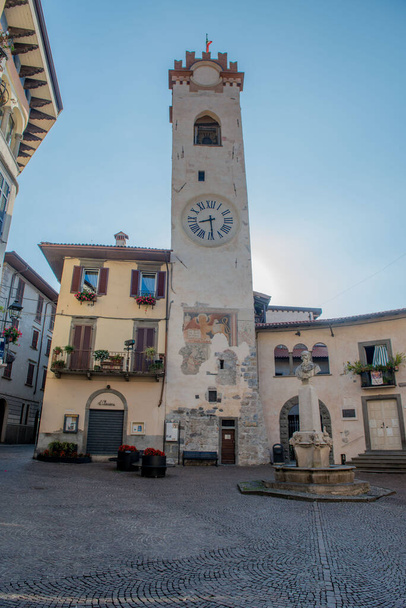 Lovere Italy 16 August 2022: Civic Tower of Lovere you can see some frescoes recalling the different lordships that dominated the town, among which a fresco with the lion stands out - Fotografie, Obrázek