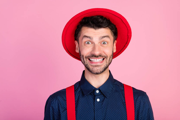 Photo of crazy cheerful person toothy beaming smile wear red hat isolated on pink color background. - Foto, Imagen