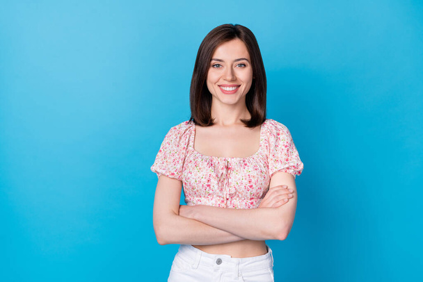 Photo portrait of cute young lady confident crossed arms freelancer wear stylish flower print clothes isolated on blue color background. - Φωτογραφία, εικόνα