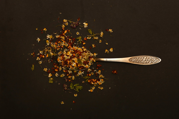 Mixed organic tea in the vintage spoon - Photo, Image