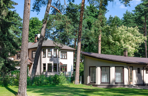 Modern family houses in the Mezaparks district, quiet and forest area of Riga, capital of Latvia - Photo, image