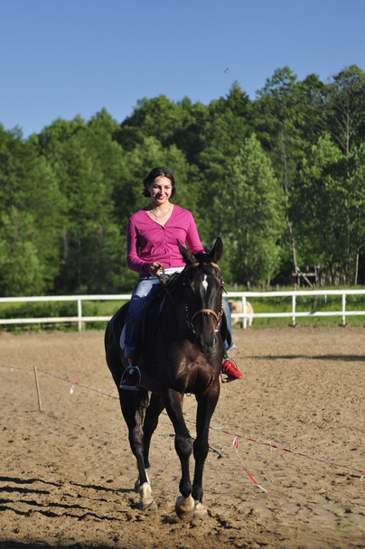 Young girl riding a horse - Fotografie, Obrázek
