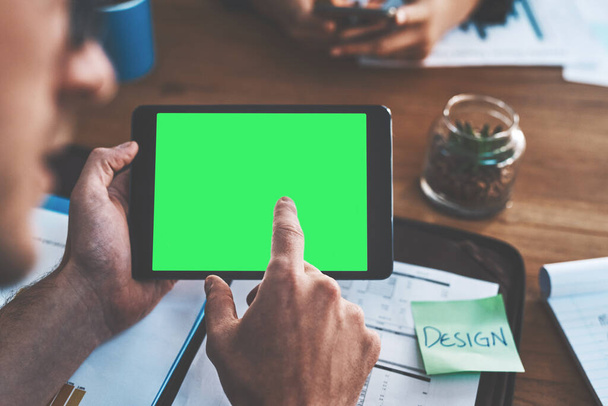Advert for marketing with a green screen, chroma key and copy space. Creative digital networking on a tablet with a business man in a meeting. Professional designer discussing vision for new design. - Fotoğraf, Görsel
