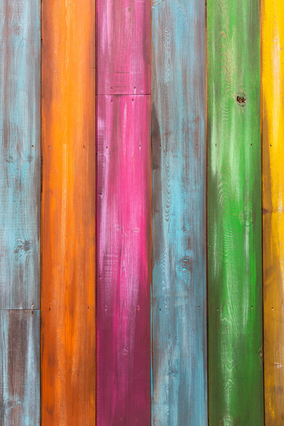 Vertical full frame background of vibrant and multi colored wooden planks with copy space - Zdjęcie, obraz