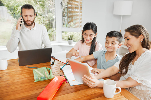 Kids education, learning and fun activity with mother teaching on tablet at home and father doing remote work in background. A multimedia, modern family enjoying online app or web with internet wifi. - Foto, imagen