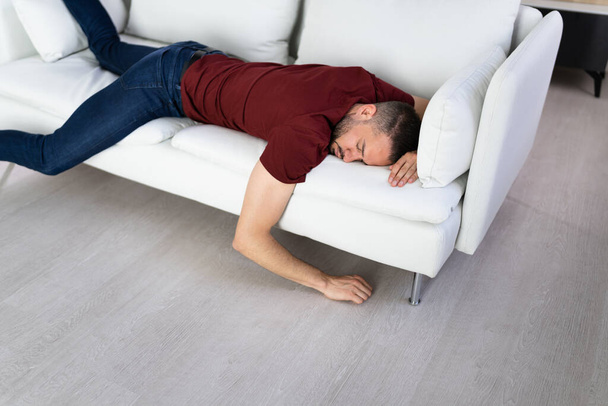 Man With Lethargy And Fatigue On Couch Or Sofa - Fotó, kép