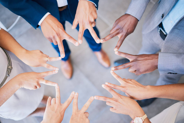 Group of colleagues peace sign hands together for victory, success and unity or teamwork, collaboration and bonding. Diverse team show support, global synergy and community, united for common goal - Fotoğraf, Görsel