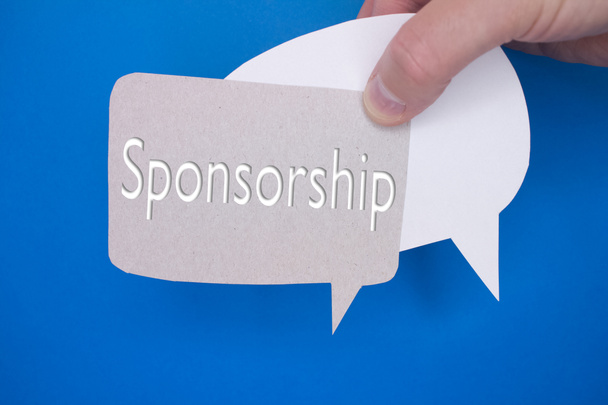 Speech bubble in front of colored background with Sponsorship text. - Foto, imagen