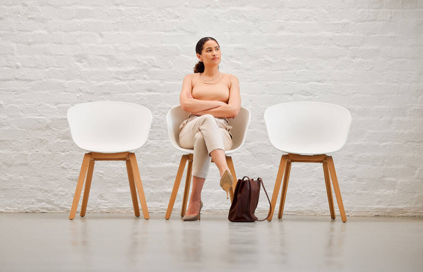 Hiring, recruitment and job interview woman waiting for employment, thinking about future career or idea for business development. Corporate professional sitting in line for new opportunity. - 写真・画像