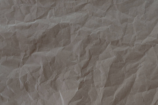 морщинистая коричневая бумага текстура, полная рама вторичной переработки бумаги фон - Фото, изображение