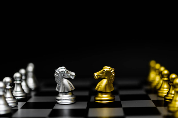 Chess game gold and silver on black background. - Foto, Imagem