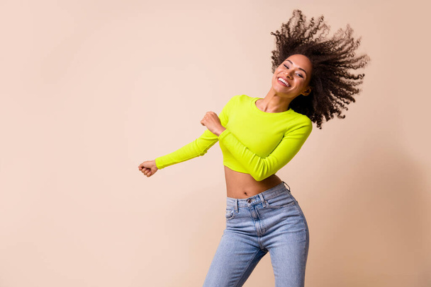 Portrait of young beautiful crazy happy lady dancing have pms health good isolated on beige color background. - Foto, Imagem