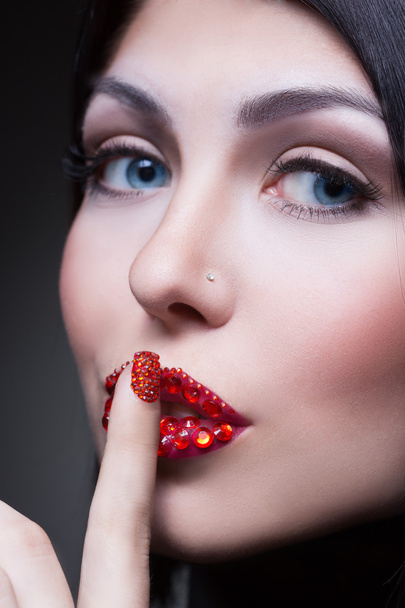 woman with rhinestones on her lips and nails - Φωτογραφία, εικόνα