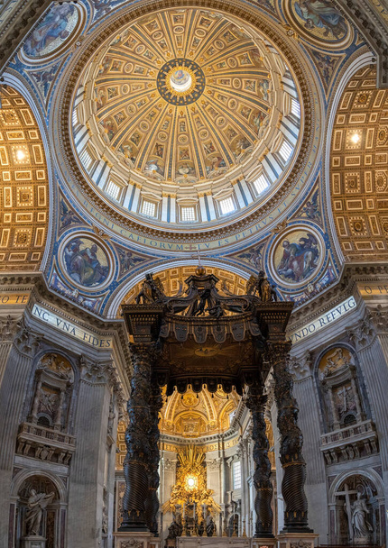The Tomb of Saint Peter under the beautifully decorated dome of Saint Peter's Basilica in Rome - Photo, Image