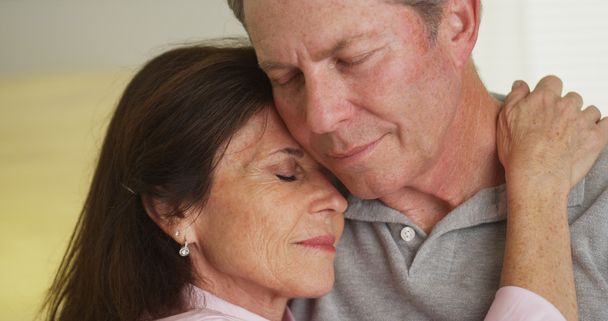 Loving elderly couple holding each other - Photo, Image