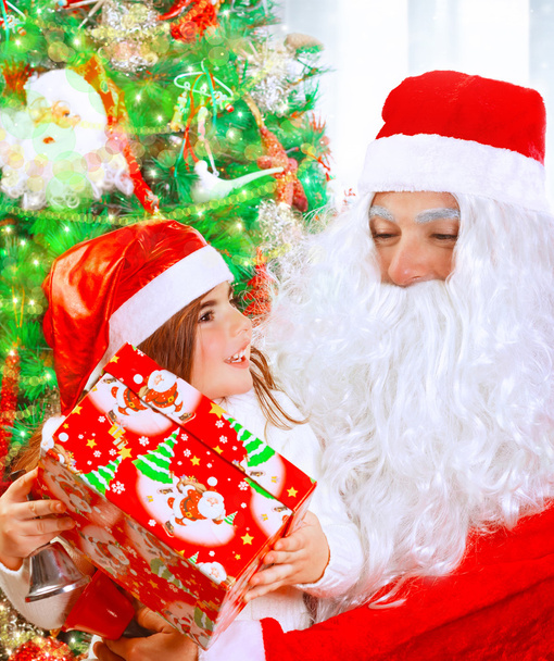 Receive present from Santa Claus - 写真・画像