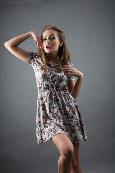 Girl in short summer dress. studio portrait - Photo, Image