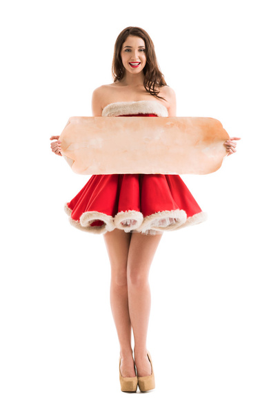 Christmas woman with roll - Фото, изображение