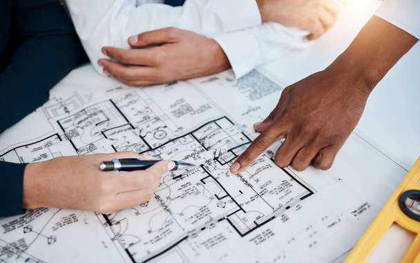 Architect people working on architecture design, blueprint or floor plan engineering with paper, hands and planning studio closeup. Business team industry workers collaboration on project development. - Foto, afbeelding