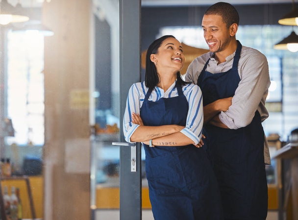 Small business owner, startup couple standing in coffee shop, cafe or store happy with business dream or entrepreneur development. Manager CEO man and woman with a vision, confidence and success. - Photo, image