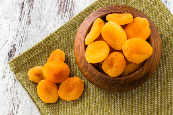 Dried Apricots in Wooden Bowl - Photo, Image