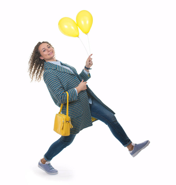 Beautiful young woman holding air balloons - Fotografie, Obrázek