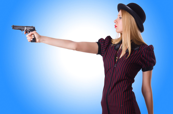 Kobietą gangstera z pistoletu - Zdjęcie, obraz