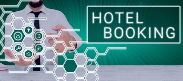 Text showing inspiration Hotel Booking, Internet Concept Online Reservations Presidential Suite De Luxe Hospitality Man With Touch Screen Displaying Digital Symbols With Creative Concepts. - Foto, Imagem