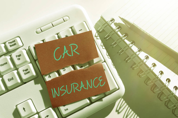 Conceptual display Car Insurance, Word Written on Accidents coverage Comprehensive Policy Motor Vehicle Guaranty Ripped Note With Important Messages Over Keyboard On Desk With Notebooks. - Photo, image