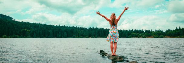 woman travelling in Auvergne- lake and forest - 写真・画像