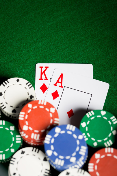 close up of casino chips and playing cards - Photo, image
