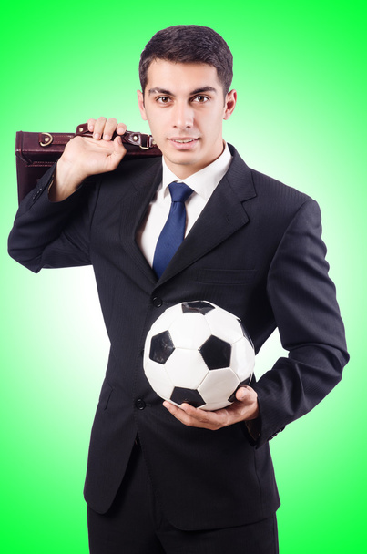 Молодой бизнесмен с футболом
 - Фото, изображение