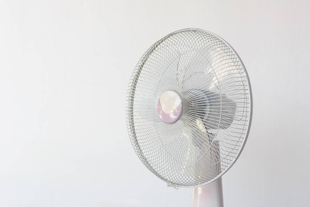 Dirty and dusty fan on white wall background. - Foto, Imagem