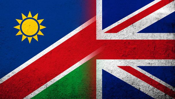 National flag of United Kingdom (Great Britain) Union Jack with The Republic of Namibia National flag. Grunge background - Foto, afbeelding