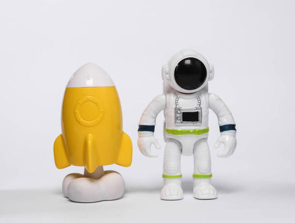 Astronaut toy model with space shuttle isolated on white background - Photo, image