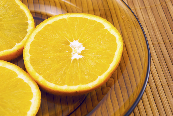 Oranges on a plate - Photo, Image