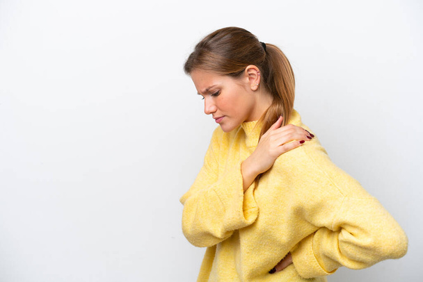 Young caucasian woman isolated on white background suffering from pain in shoulder for having made an effort - Foto, afbeelding