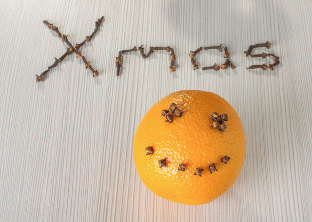 Arancione con sorriso con testo Natale
 - Foto, immagini