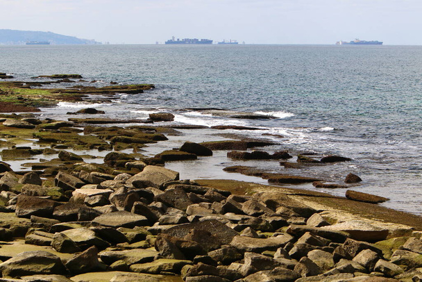 Large stones on the shore of the Mediterranean Sea  - Photo, image