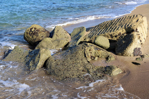 Large stones on the shore of the Mediterranean Sea  - Photo, image