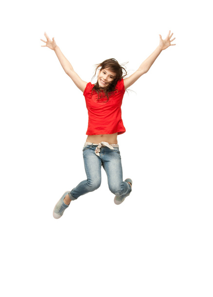 Jumping teenage girl - Фото, зображення