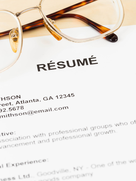 Resume with pen on table closeup - Photo, Image