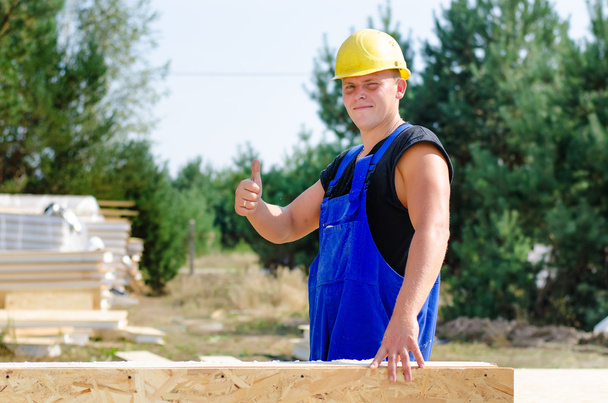 Builder giving a thumbs up gesture - Fotografie, Obrázek