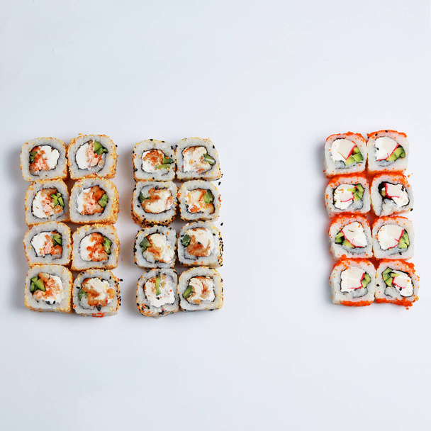 Assorted sushi set on white background. - Photo, Image