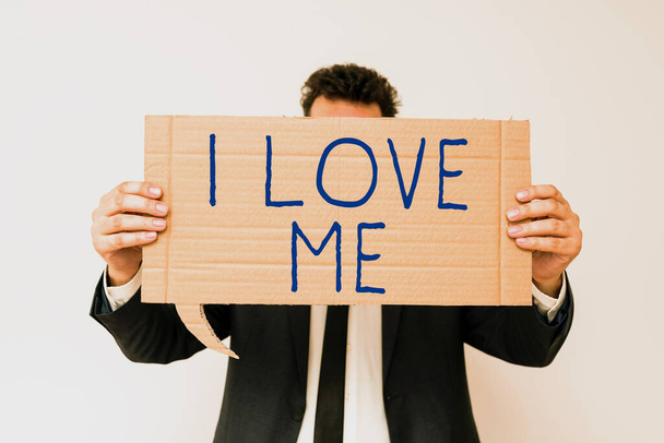 Text showing inspiration I Love Me, Conceptual photo To have affection good feelings for oneself selfacceptance Businessman Holding Speech Bubble With Important Informations. - Photo, image