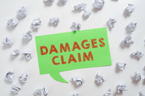 Inspiration showing sign Damages Claim, Business idea Demand Compensation Litigate Insurance File Suit Paper Wraps Placed Around Speech Bubble With Important Information. - Valokuva, kuva