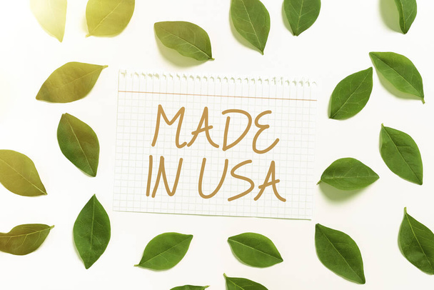 Writing displaying text Made In Usa, Business approach American brand United States Manufactured Local product Notebook Sheet With Fresh Leaves For Creative Invitation And Cards. - Foto, imagen